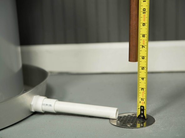 Terminate the discharge pipe at least 1&quot; and a maximum of 6&quot; above a floor drain or outside. Do not drain the discharge pipe into the drain pan; instead, pipe it to an adequate drain.