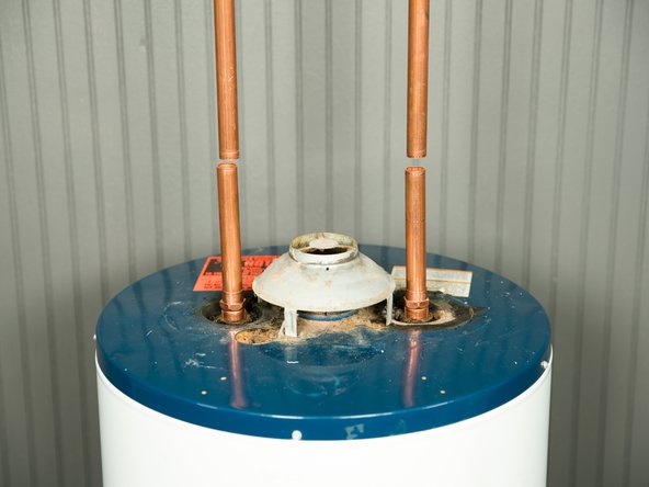 Disconnect the cold and hot water pipes attached to the old water heater. Many are connected with  a threaded union that can be disconnected with wrenches.