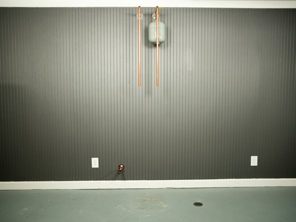 CAUTION: Water heaters are heavy. Use two or more people to remove or install a water heater if you don't have an appliance dolly. Failure to do so can result in back or other injury.