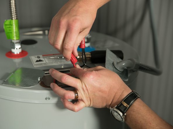 Connect the home’s two power wires to the water heater’s two service wires. Use suitable wire nuts or other approved means to make the power connections.