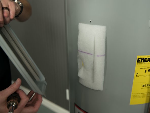 Remove the heating element cover.