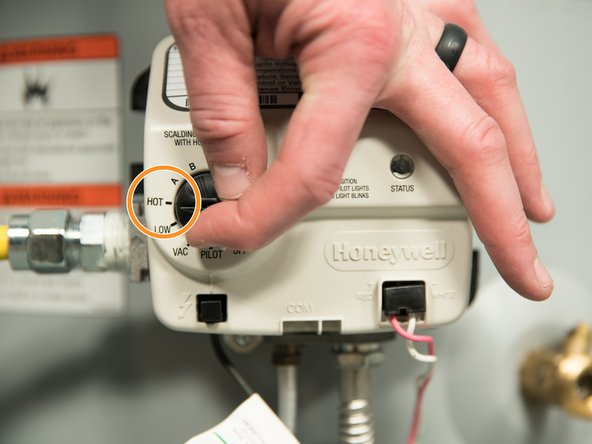 Read and follow the scald warning information on the water heater and in the owner's manual.