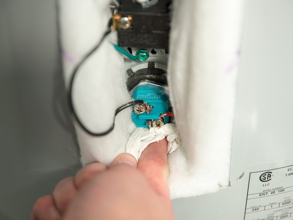 If a leak is present, tighten the element until the leak stops. If you cannot stop the leak, drain the tank and remove the element. Inspect the gasket for damage. If the gasket is damaged, replace the gasket and re-install the element.