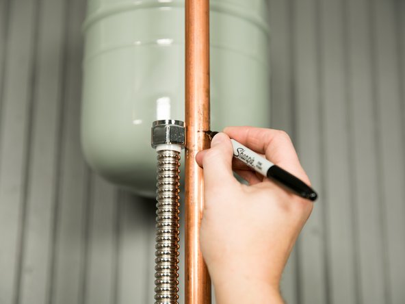 If you are using the installation kit, measure both of the water lines.
