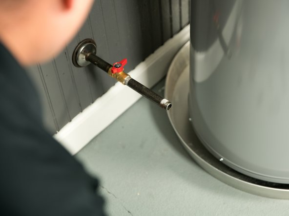 Remove cap from gas pipe.