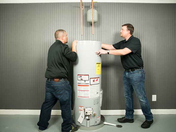 CAUTION: Water heaters are heavy. Use two or more people to remove or install a water heater if you don't have an appliance dolly. Failure to do so can result in back or other injury.