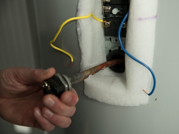 If the resistance is outside this range remove the bad element using an element wrench or 1 1/2&quot; deep well socket .