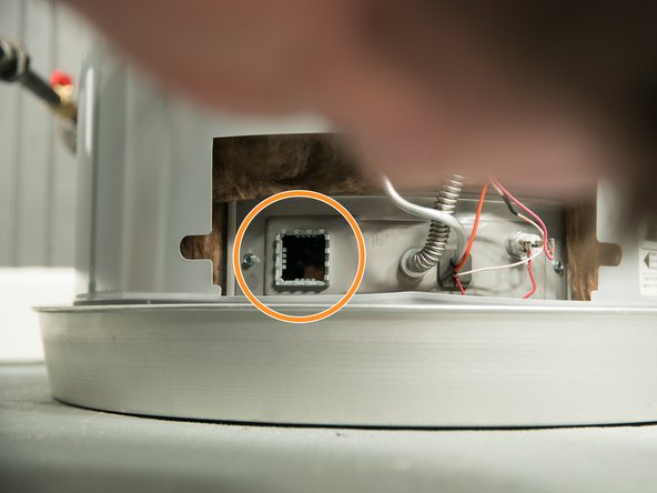 While keeping the pilot knob pressed in, press the igniter button and then look through the site glass for the pilot.