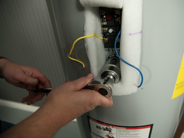 Unscrew the old element with an element wrench.