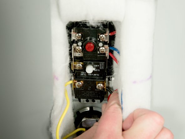 Attach the wires following the wiring diagram on the water heater’s label. Make sure all wire connections are tight.