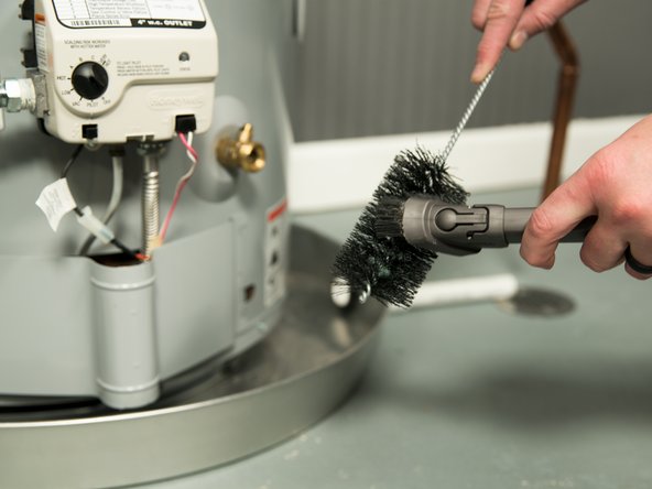 Remove the brush and vacuum off any lint or dust.