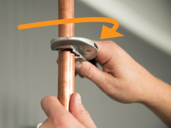 Cut both of the water pipes, but leave them a little longer than the measurement. You can always cut them shorter if necessary.