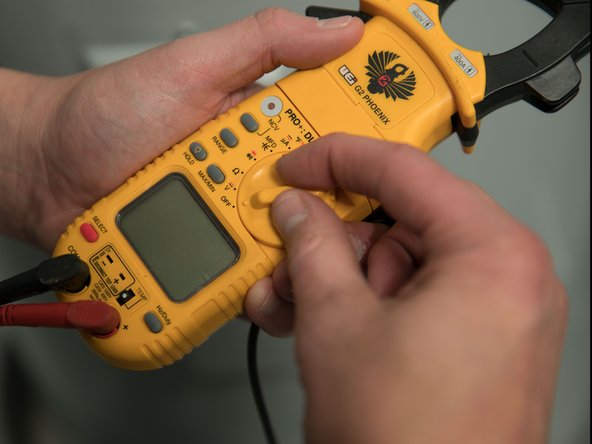 Set the multimeter to read AC Volts.