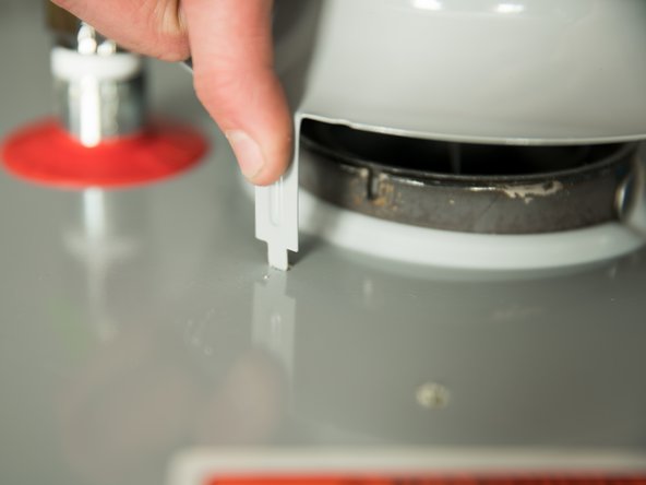 Do not reuse the draft hood from the old water heater. Use the new draft hood that came with your new water heater.