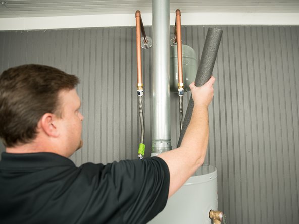 CAUTION! The vent pipe maybe hot. Use caution when removing the insulation from the water pipes.