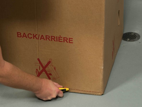 Cut the water heater box along the dotted lines.