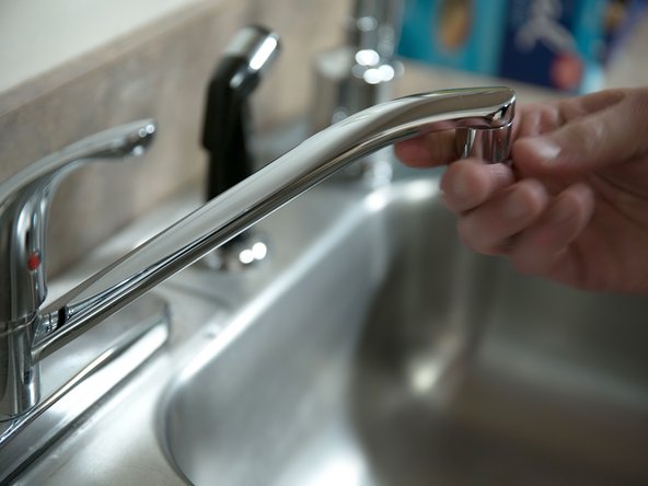 After all of the air has been removed from the tank, close the hot water faucet and replace the aerator.