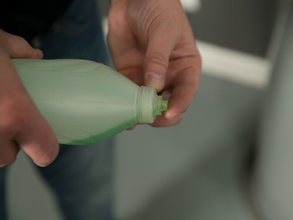 Lubricate the gasket of the new element with dish soap.