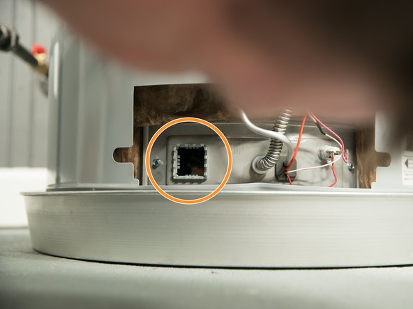 While keeping the pilot knob pressed in, press the igniter button and then look through the site glass for the pilot.