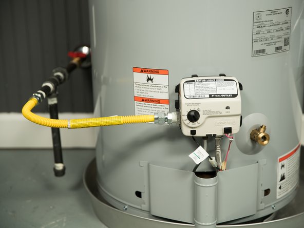 Install the flexible gas line connector.