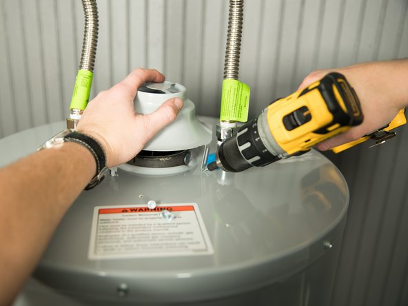 Secure the draft hood using the four screws provided.