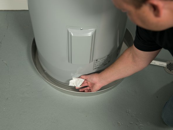 Use a dry paper towel to determine the source of the leak.