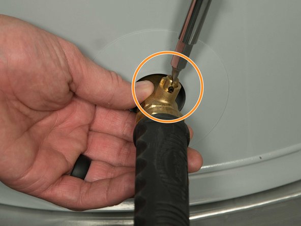Some drain valves may have a handle but others require a flat blade screwdriver. 
