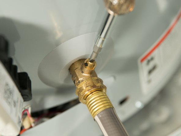 When you're done, close the drain valve and remove the garden hose.