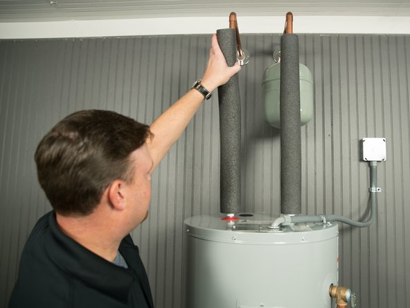 Remove the insulation from the water pipes, if present.
