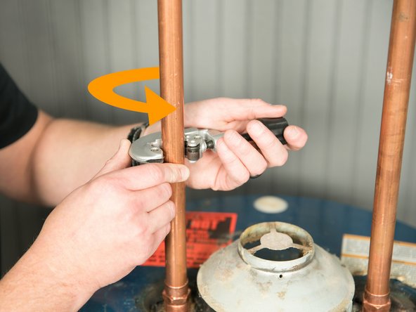 Disconnect the cold and hot water pipes attached to the old water heater. Many are connected with  a threaded union that can be disconnected with wrenches.