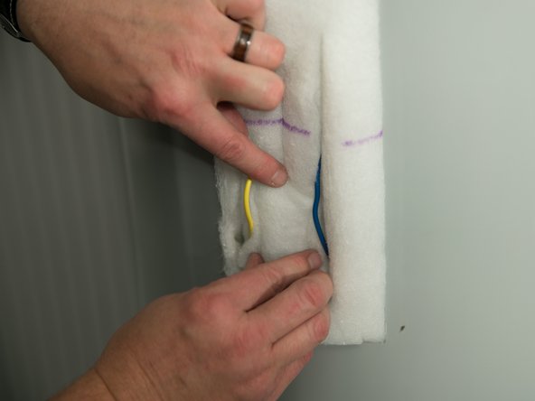 Fold the insulation back in place.