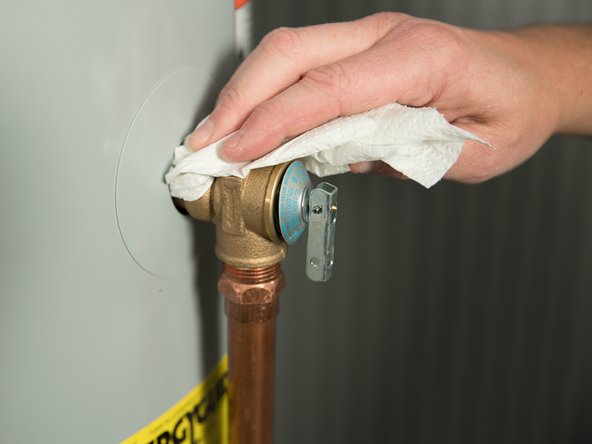 Use a dry paper towel to determine the source of the leak.