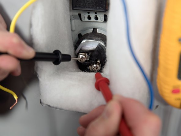 A good element will have a resistance  between 5 and 25 Ohms. If the reading is outside that range See Checking/Replacing Heating Elements.