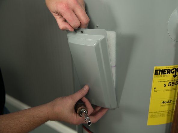 Remove the upper and lower element covers.