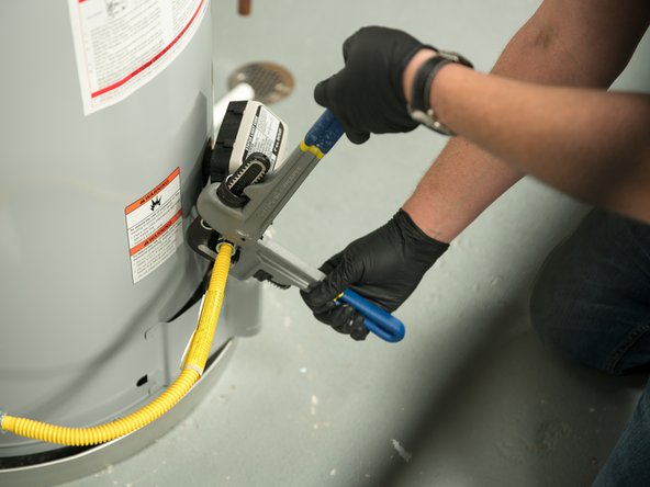 Install the flexible gas line connector.