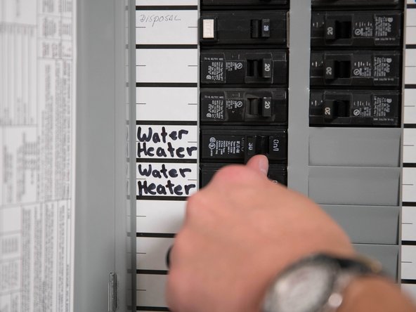 Turn the power to the water heater OFF at the circuit breaker (or remove fuses).