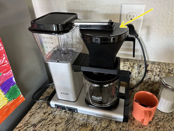 Place the lid over the filter basket.