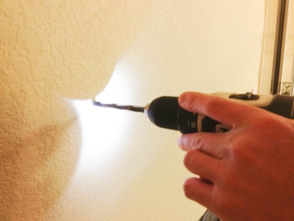 Depending on the size of bolts included with your kit, drill 4 holes in the locations you marked in the previous step.