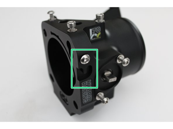 If you are installing your HR throttle body onto the Acura RSX, use the supplied bolt and groove circled in green to mount the OE throttle cable holder. (Optional)