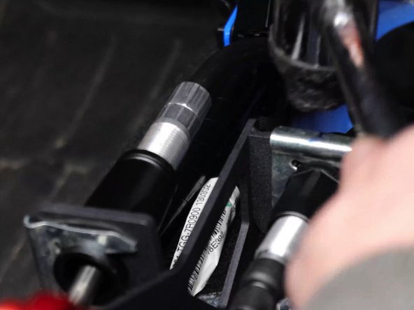 Now install the shifter cable retaining spring clips.