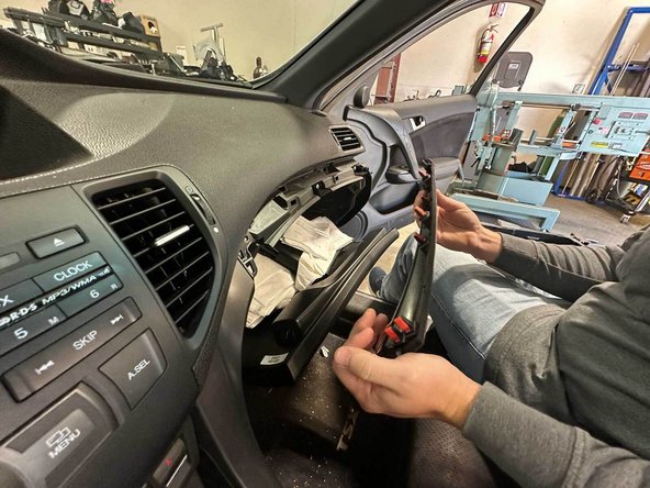 Once the panel is removed remove this screw to free up the side panel.