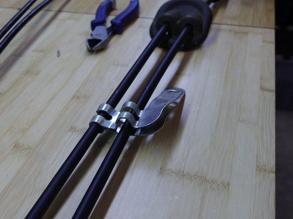 Remove the bracket and transfer it to the HR cables. You will need to bend the metal tabs apart.