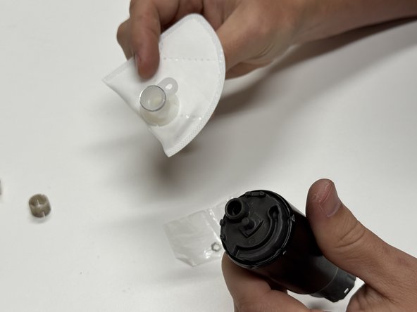 Install the new Hybrid Racing pump filter onto the Hybrid Racing pump motor.