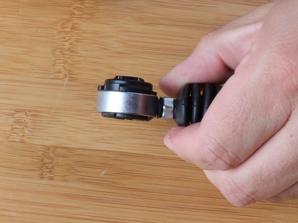 You will hear the bushing &quot;snap&quot; into place. Once that happens, the installation is complete.