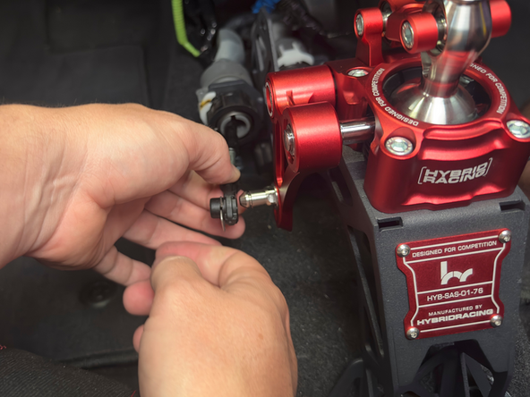 Install the supplied shifter offset and rod.