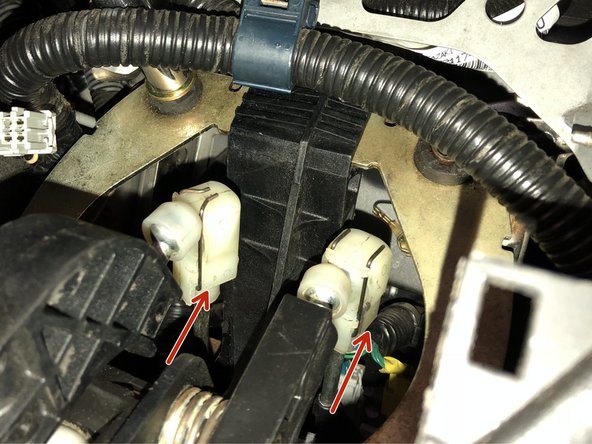 Be careful as the retaining rings can slide completely off and can be hard to find if they fall down in the dash. You do not need to remove the clips completely, just slide them apart so you can pull the cable end link off.