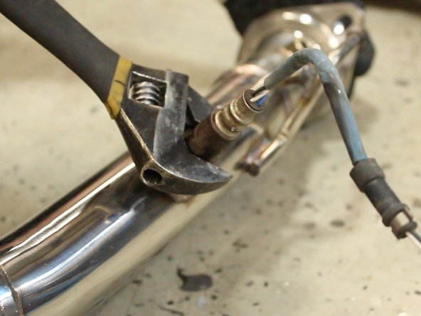 Install the o2 sensor in the first port closest to the flange that attaches to the engine.