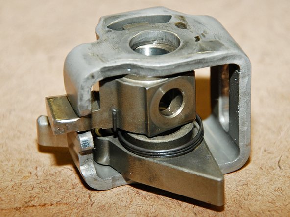 Once the bolt is out, carefully slide the gear selector off, making sure to keep all the parts in order.