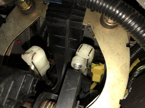 In order to remove them you must spread the metal retaining ring apart and slide the cable off the end.