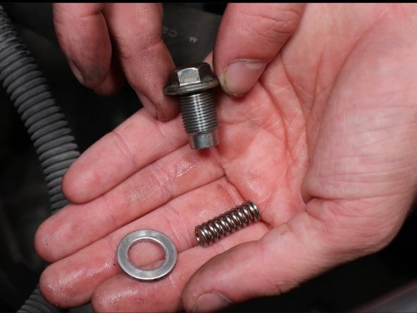 You may need to add a dab of Hondabond to the threads to prevent transmission fluid leaks.